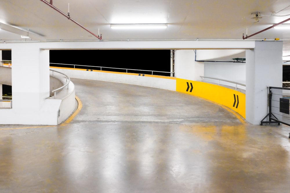 Concrete ramp in a parking garage.