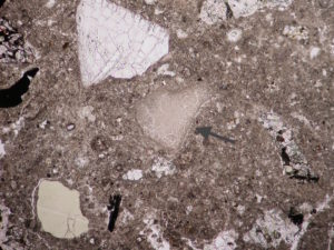 thin section photomicrograph of stone veneer mortar
