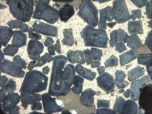 microscopic view of portland cement clinker