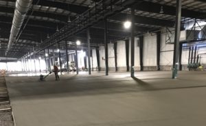 placing and finishing an industrial concrete floor