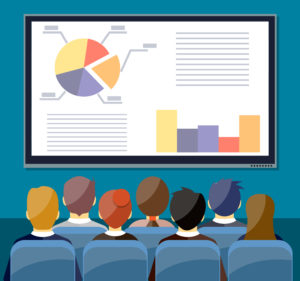 audience viewing a too-busy slide shows death by PowerPoint in action