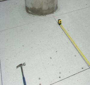 aggregate popouts on an exterior concrete slab