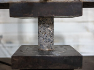 compressive strength testing of concrete cores